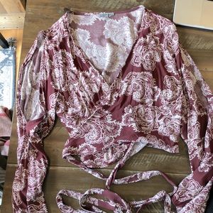 Wrap crop with open sleeves